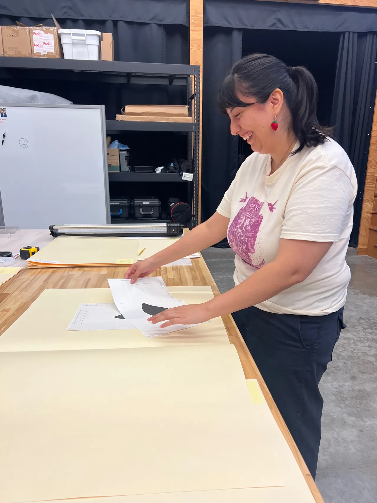 Jennifer sorting records chronologically in archival folders