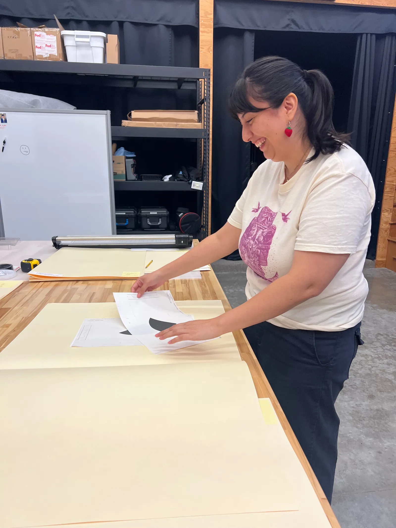 Jennifer sorting records chronologically in archival folders