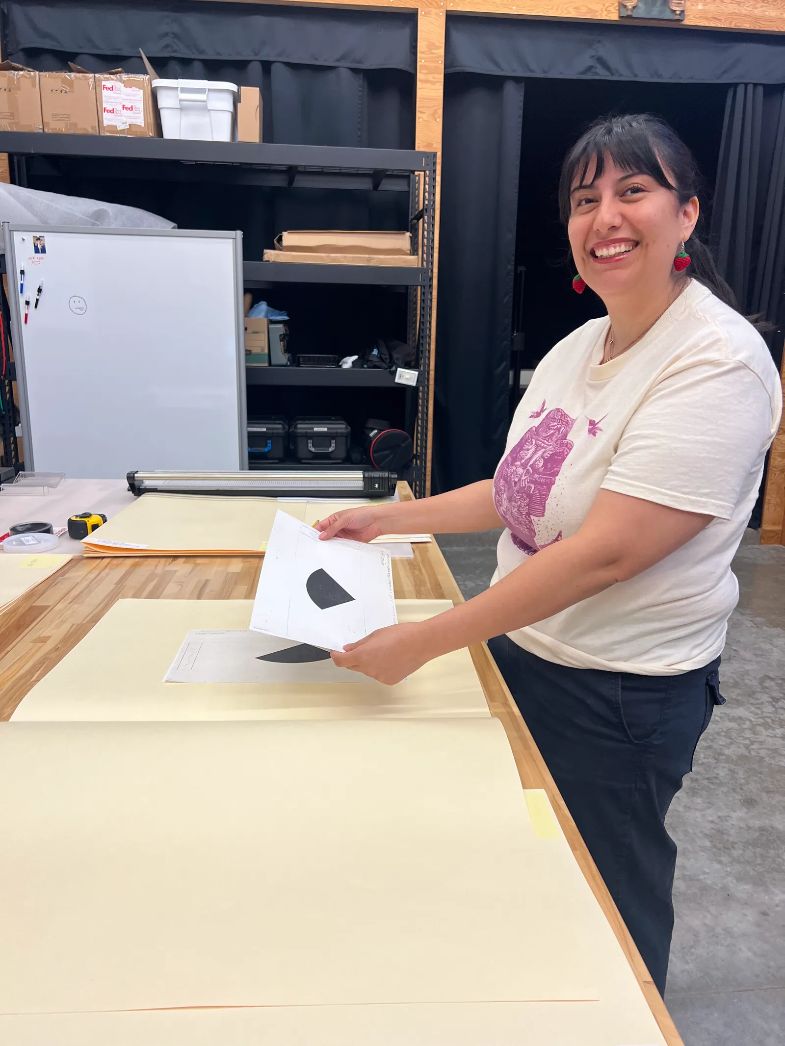 Jennifer organizing files and folders on a workspace table