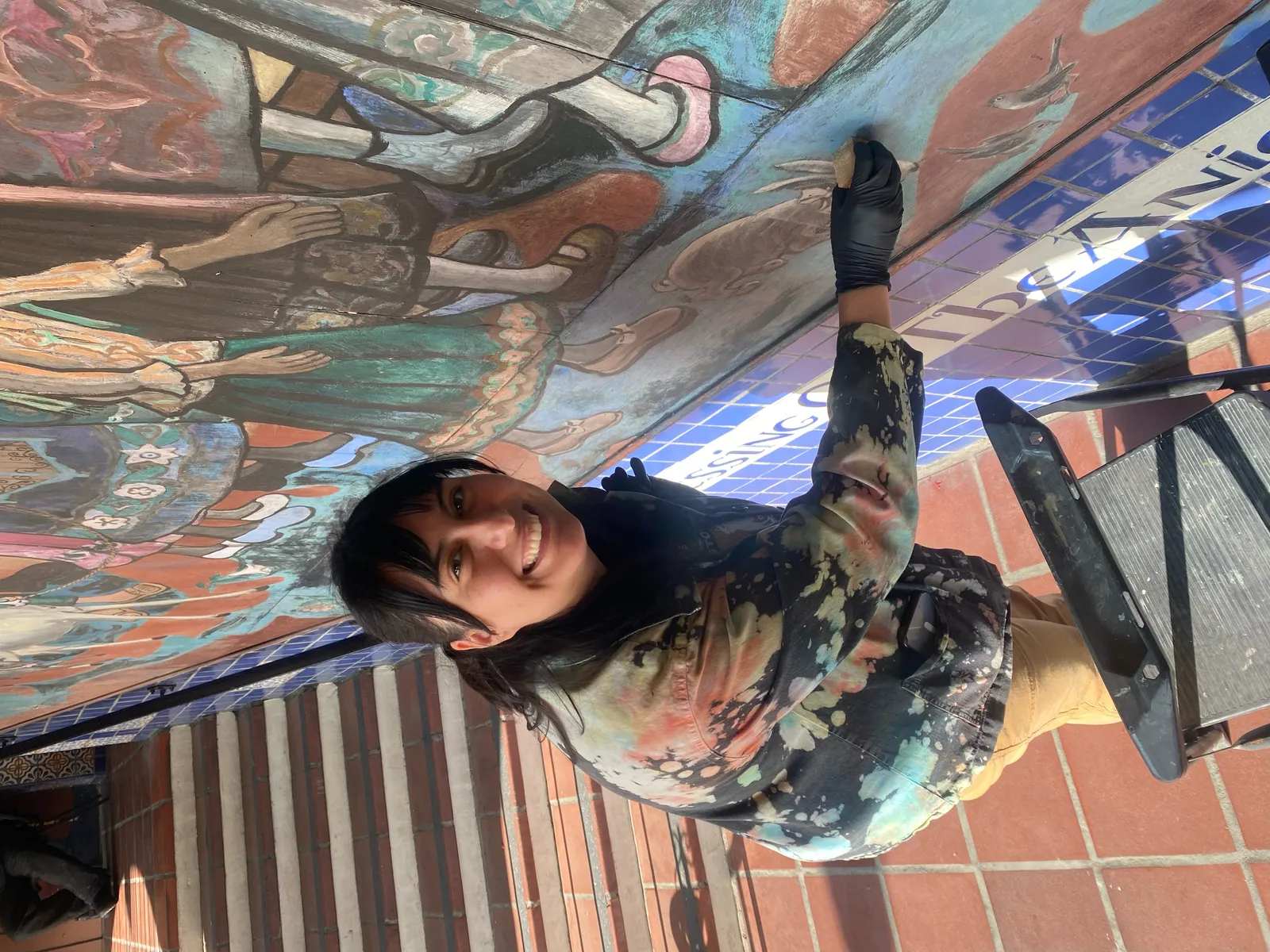 Jennifer analyzing mural sections in Downtown Los Angeles