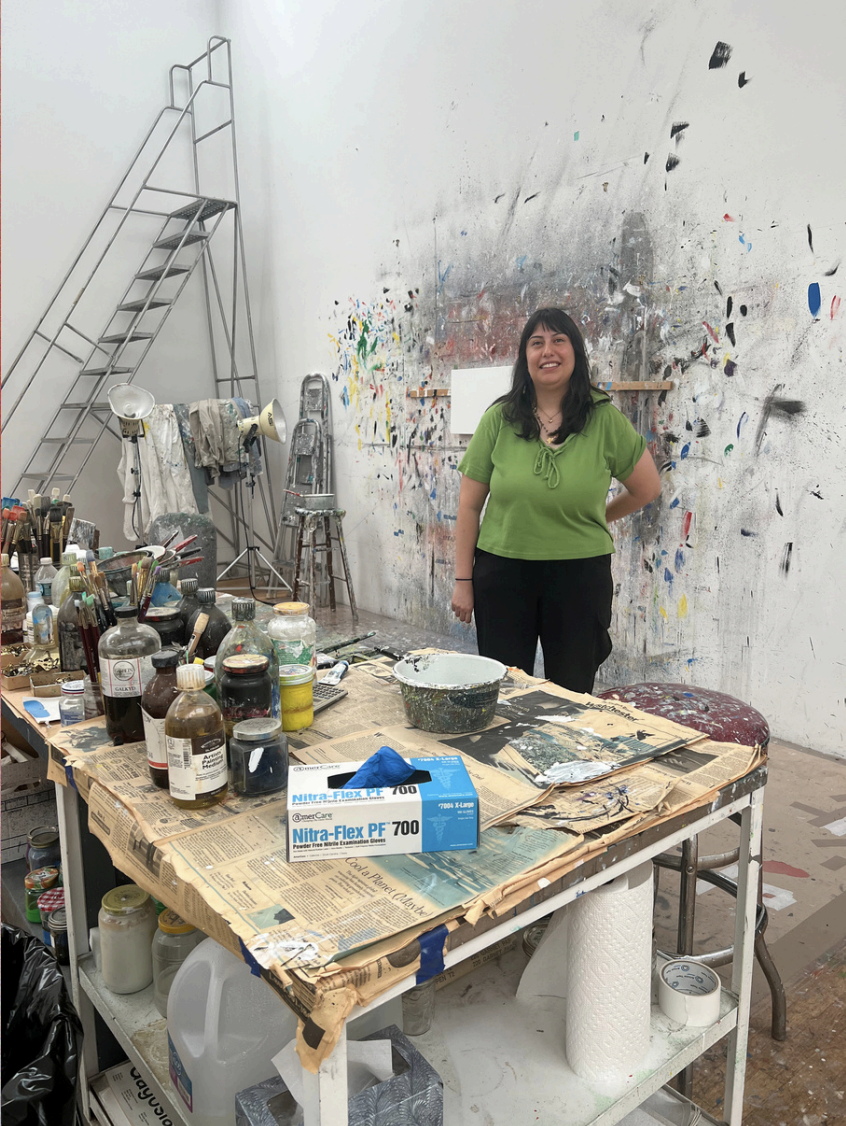 Jennifer standing in Ellsworth's Studio